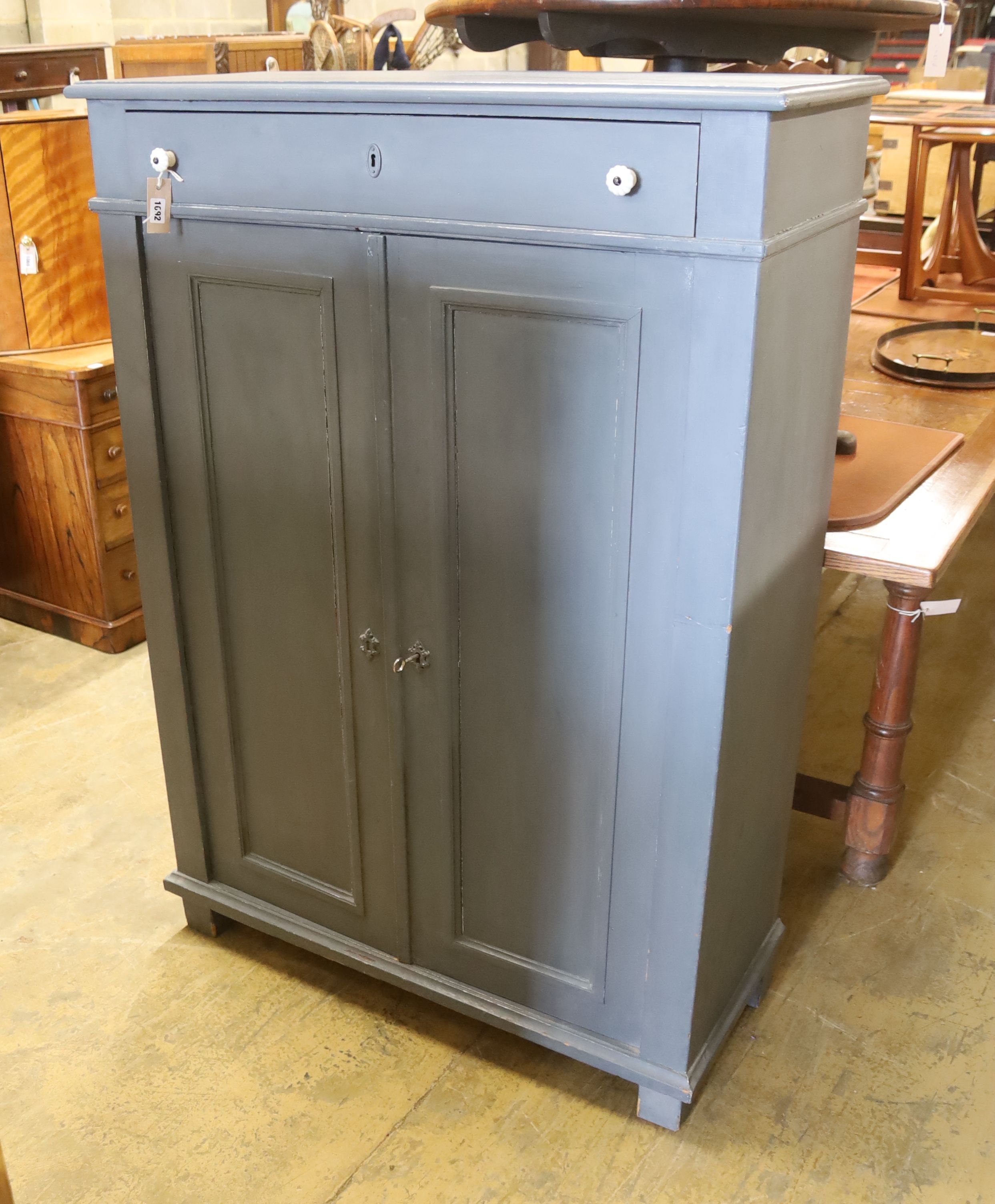 A East European painted pine cabinet, width 98cm, depth 41cm, height 140cm